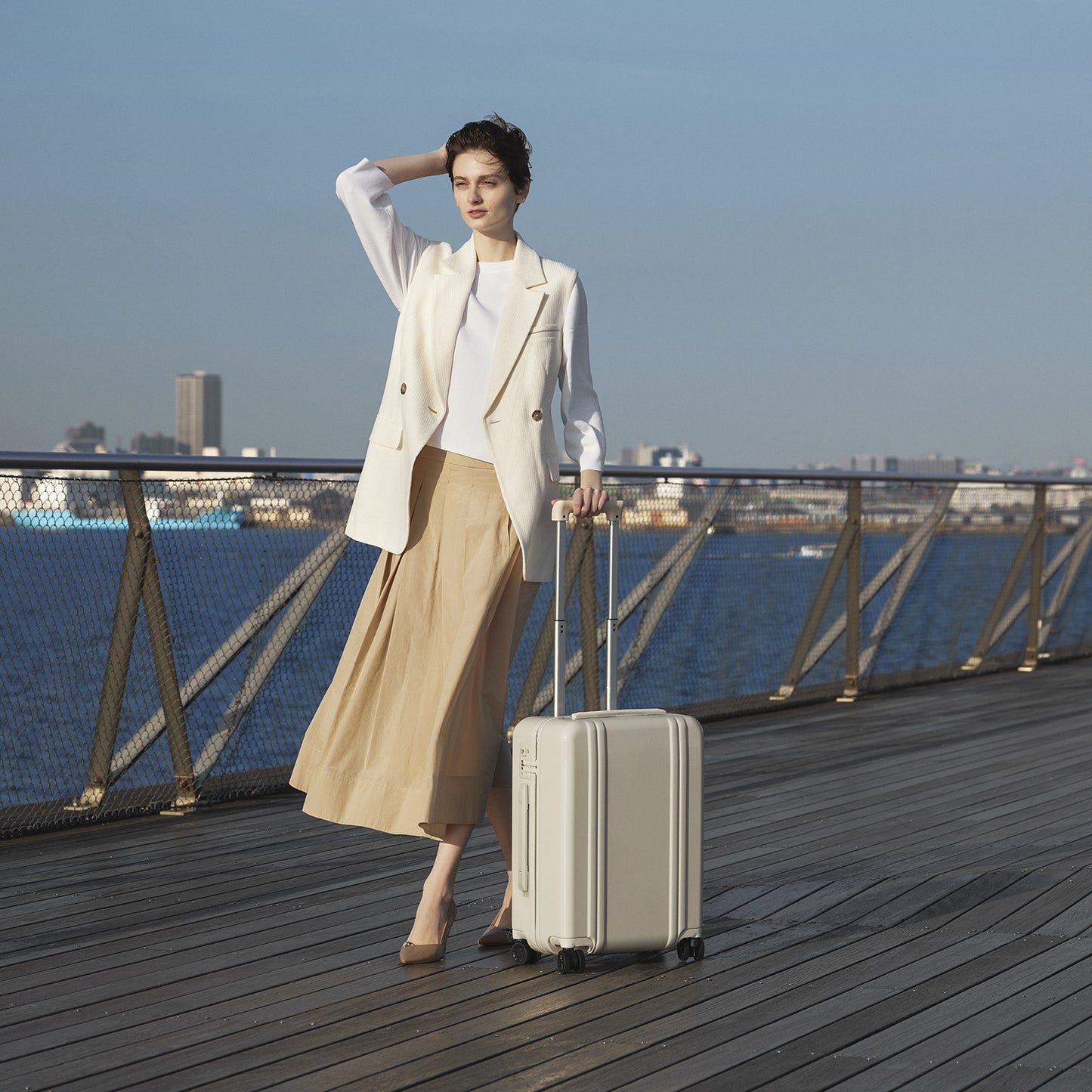 CREME - Lifestyle Shot Walking with Carry-on