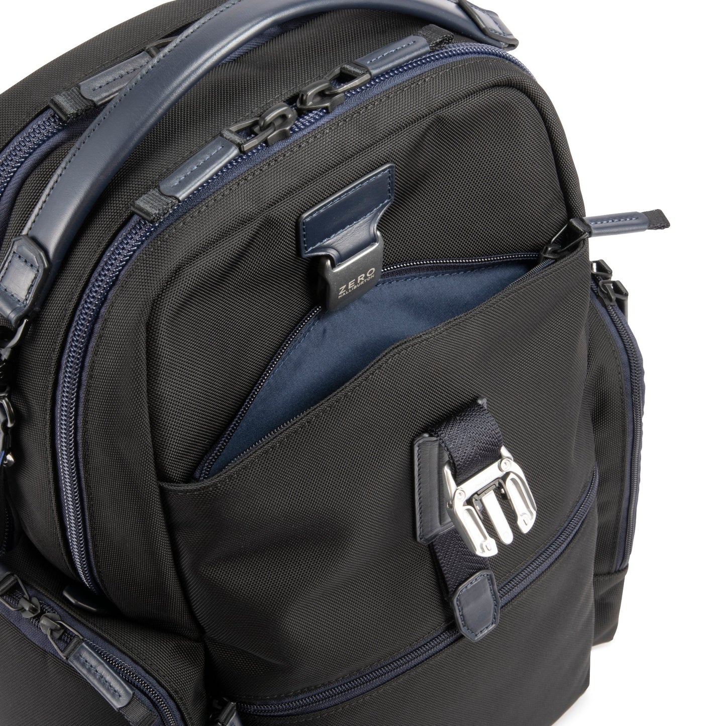 Navy - backpack with multiple zippers and a visible brand logo on a white background