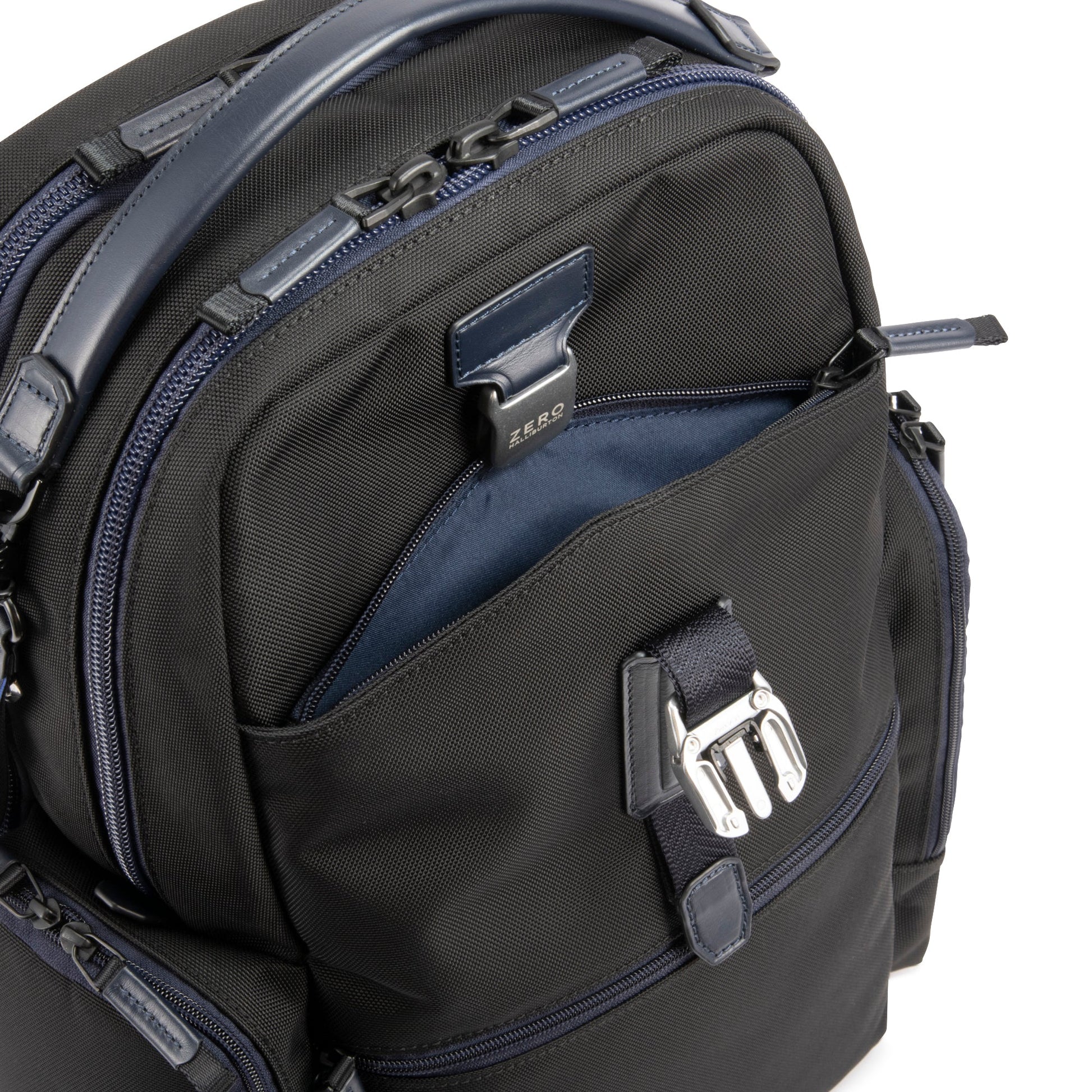 Navy - backpack with multiple zippers and a visible brand logo on a white background