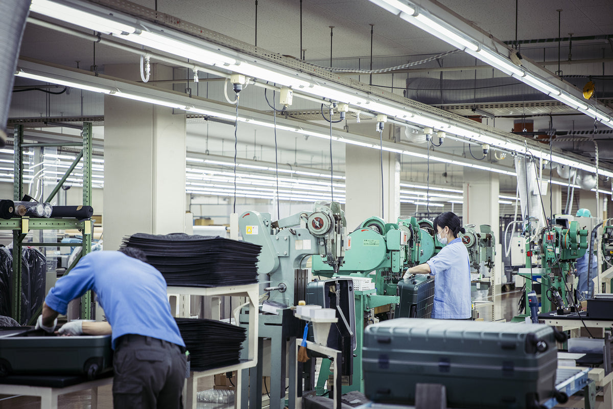 Skilled workers assembling PROTECA luggage at the Akabira Factory