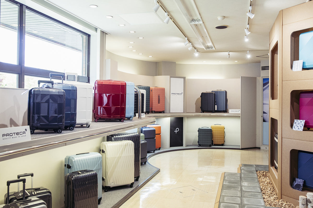 PROTECA exhibition room showcasing luggage collections and designs
